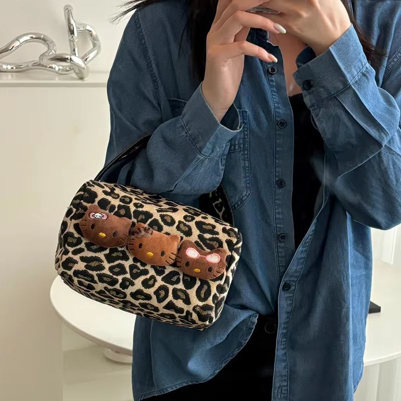 Skincare D'Alba - Hello Kitty leopard print plush handbag,